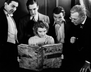 The cast of Dracula looking up its source in this publicity still